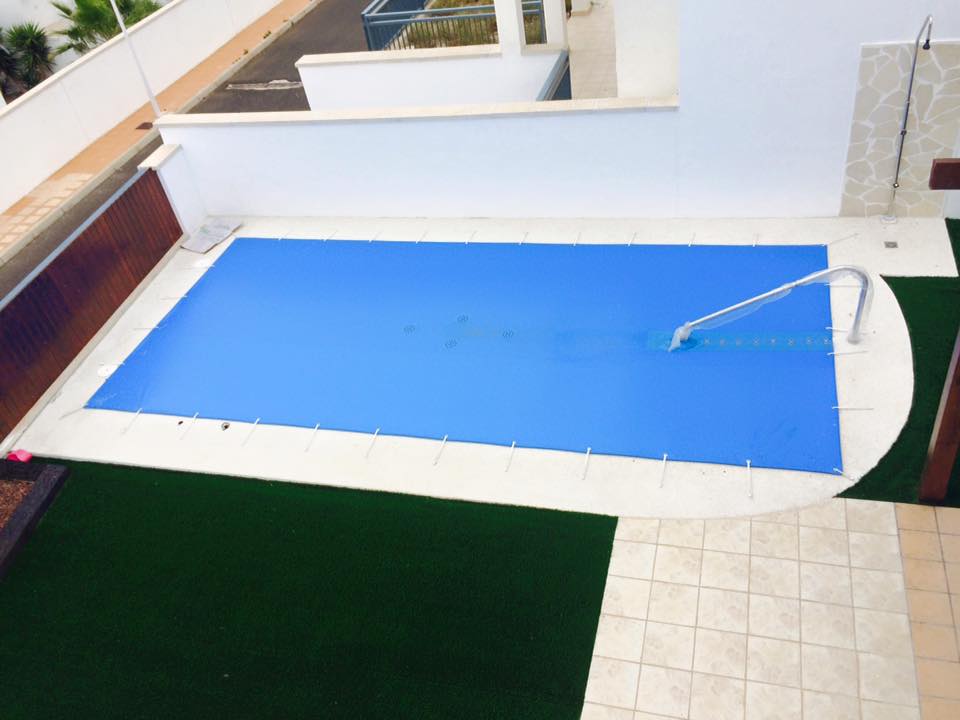 Manta protectora de piscina